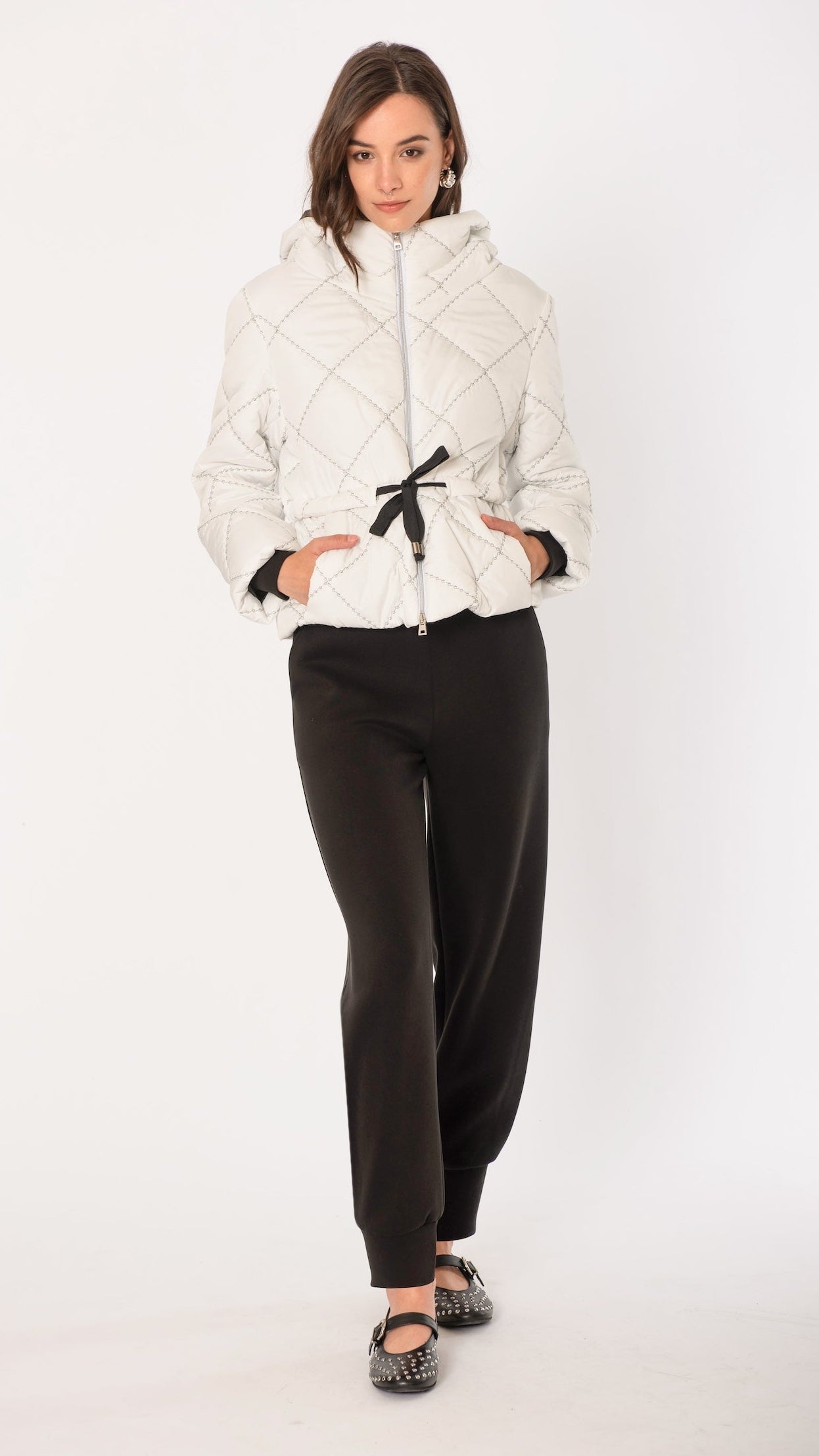 Piumino con impunture contrasto